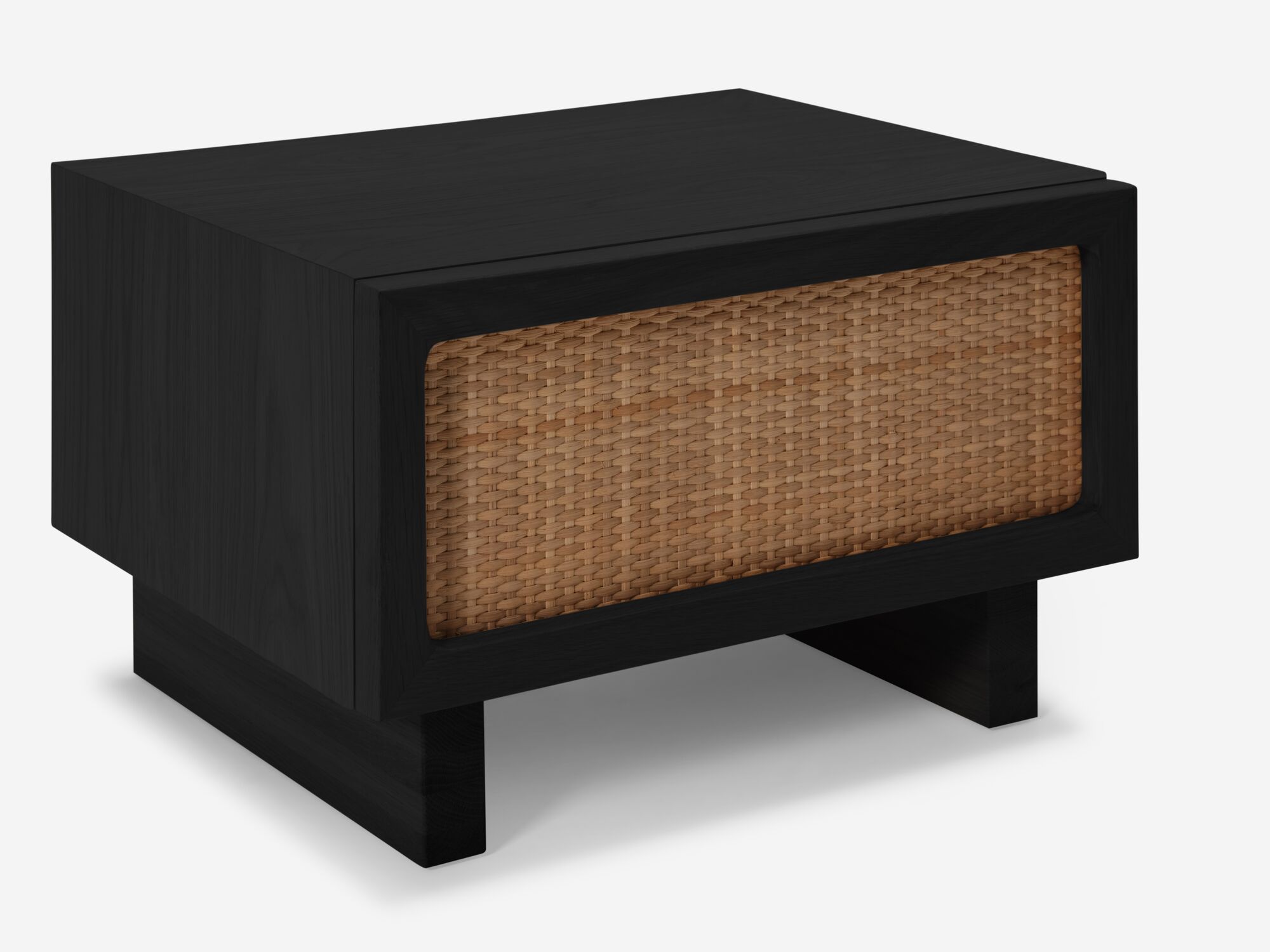 Detail view of black oak nightstand with woven drawer fronts